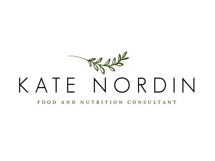 Simple  logo  of the name “Kate Nordin” beneath a vine with multiple leaves